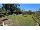 Spacious backyard showing ample seating and lounging areas at 7818 Lewis Rd, Lakeland, FL 33810