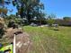 Spacious backyard showing ample seating and lounging areas at 7818 Lewis Rd, Lakeland, FL 33810