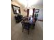 Traditional dining room with a wooden table and decorative accents at 7818 Lewis Rd, Lakeland, FL 33810
