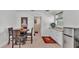 Bedroom features a dining set, kitchenette with sink and mini-fridge, and decor at 822 W Patterson St, Lakeland, FL 33803