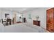 Cozy bedroom with sleek wood-look floors, decor and a partial view of a comfortable queen bed at 822 W Patterson St, Lakeland, FL 33803