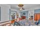 Bedroom with fireplace and hardwood floors at 822 W Patterson St, Lakeland, FL 33803