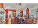 Formal dining room featuring a grand chandelier and hardwood flooring at 822 W Patterson St, Lakeland, FL 33803