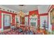 Classic dining room featuring elegant decor and seamless flow to other rooms at 822 W Patterson St, Lakeland, FL 33803