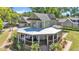 Charming two-story home with wraparound porch and mature landscaping at 822 W Patterson St, Lakeland, FL 33803