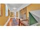 Hallway with hardwood floors and decorative rug at 822 W Patterson St, Lakeland, FL 33803