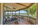 Spacious porch overlooking the water is furnished with seating at 822 W Patterson St, Lakeland, FL 33803