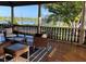 Inviting porch with comfortable seating, wood flooring and a scenic water view at 822 W Patterson St, Lakeland, FL 33803
