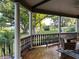 Enjoy views of the lake and surrounding greenery from this spacious covered porch at 822 W Patterson St, Lakeland, FL 33803
