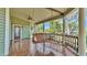 Relaxing porch with a wooden swing, offering a serene outdoor space at 822 W Patterson St, Lakeland, FL 33803