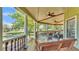 Enjoy the water view from the home's porch with a swing and seating at 822 W Patterson St, Lakeland, FL 33803