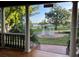 Charming gazebo on the lawn, viewed from the covered porch with brick accents at 822 W Patterson St, Lakeland, FL 33803