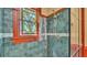 Shower stall with rain shower head and accent tiles at 822 W Patterson St, Lakeland, FL 33803