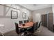 Basement room with a poker table, ceiling fan, track lighting and card-themed wall art at 8931 Sugar Palm Rd, Kissimmee, FL 34747