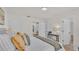Spacious bedroom with a comfortable bed and view to other rooms in the house at 919 S Missouri Ave, Lakeland, FL 33803