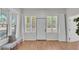 Charming living room filled with natural light, highlighting the stylish flooring and inviting space at 919 S Missouri Ave, Lakeland, FL 33803