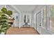 Inviting living room featuring modern flooring, a cozy fireplace, and ample natural light at 919 S Missouri Ave, Lakeland, FL 33803