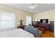 Large bedroom with hardwood floors, large windows, and plenty of storage at 934 Lake Elbert Se Dr, Winter Haven, FL 33880