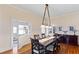 Traditional dining room featuring hardwood floors and natural light, great for Gathering gatherings at 934 Lake Elbert Se Dr, Winter Haven, FL 33880