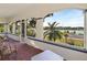 Enclosed porch offering serene waterfront views at 934 Lake Elbert Se Dr, Winter Haven, FL 33880