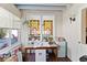 Cozy sunroom with tiled flooring, stained glass windows, and ample natural light perfect for relaxing at 934 Lake Elbert Se Dr, Winter Haven, FL 33880