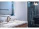 Stylish bathroom with granite countertop, chrome faucet, and a large glass-enclosed shower at 942 Hanover Way, Lakeland, FL 33813