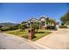 Charming home featuring lush landscaping and a welcoming entrance for a cozy curb appeal at 942 Hanover Way, Lakeland, FL 33813