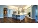 Open concept kitchen with large center island, eat in seating, and stainless steel appliances at 942 Hanover Way, Lakeland, FL 33813