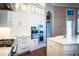 Modern kitchen featuring quartz countertops, stainless steel appliances, and plenty of storage space at 942 Hanover Way, Lakeland, FL 33813