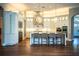 Bright, open kitchen featuring a center island with barstool seating and stainless steel appliances at 942 Hanover Way, Lakeland, FL 33813