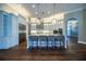 Bright, open kitchen featuring a center island with barstool seating and stainless steel appliances at 942 Hanover Way, Lakeland, FL 33813