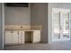 Outdoor kitchen boasts ample storage and countertop space perfect for entertaining outside at 942 Hanover Way, Lakeland, FL 33813