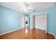 Bedroom features hardwood floors and closet at 1104 Kells Ct, Lakeland, FL 33813