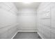 Spacious walk-in closet featuring built-in shelving for maximum storage at 1104 Kells Ct, Lakeland, FL 33813