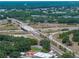 Aerial view of the surrounding community showing highway and neighborhood at 1720 Kendrick Ln, Lakeland, FL 33805