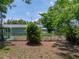 A full shot of the backyard area surrounded by a metal fence at 1720 Kendrick Ln, Lakeland, FL 33805