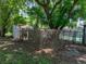 Outdoor storage shed with fence at 1720 Kendrick Ln, Lakeland, FL 33805