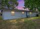 Exterior of the home showing the backyard with green lawn and easy access at 1720 Kendrick Ln, Lakeland, FL 33805