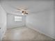 Bright bedroom with a ceiling fan and natural light at 1720 Kendrick Ln, Lakeland, FL 33805