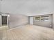 Spacious living room featuring neutral walls, tile floors, and a bright, welcoming atmosphere at 1720 Kendrick Ln, Lakeland, FL 33805