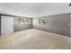 Bright living room with tile floors, neutral walls, and a well-lit interior space at 1720 Kendrick Ln, Lakeland, FL 33805