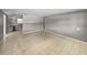 Open living area with tile floors, neutral walls, and ample natural light at 1720 Kendrick Ln, Lakeland, FL 33805