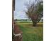 Lush backyard with a view of the lake at 1920 E Edgewood Dr # T6, Lakeland, FL 33803