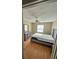 Bedroom with neutral walls, modern furniture, and ample natural light at 1920 E Edgewood Dr # T6, Lakeland, FL 33803