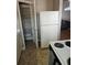 Kitchen featuring standard appliances, lots of storage and adjacent walk-in pantry at 1920 E Edgewood Dr # T6, Lakeland, FL 33803
