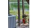 Outdoor patio features a glimpse of a peaceful lake, enhancing the home's appeal at 1920 E Edgewood Dr # T6, Lakeland, FL 33803