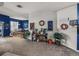 Comfortable living room with view to eat-in kitchen, decor, and backyard access at 2033 Normandy Heights Dr, Winter Haven, FL 33880