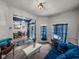 Open concept living room showcases stylish furnishings and transitions into the dining area at 2033 Normandy Heights Dr, Winter Haven, FL 33880