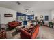 Bright living room with sliding door access to the backyard and views to the eat-in kitchen at 2033 Normandy Heights Dr, Winter Haven, FL 33880