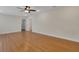 Spacious bedroom featuring gorgeous hardwood floors and neutral paint at 2814 Coventry Ave, Lakeland, FL 33803